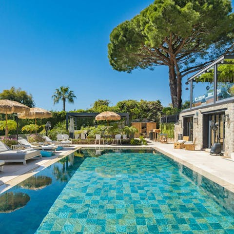 Spend lazy days around the private pool, surrounded by trees