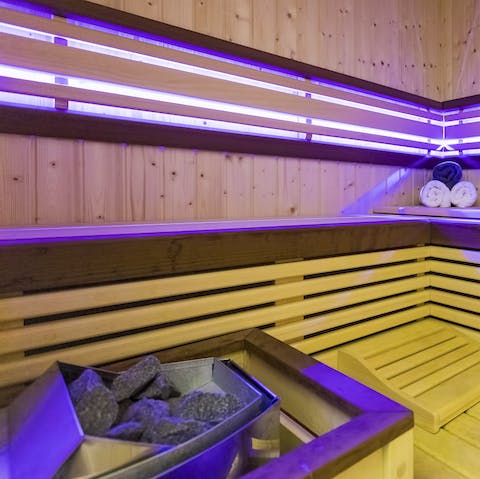 Take a moment to unwind in style in the Finnish sauna