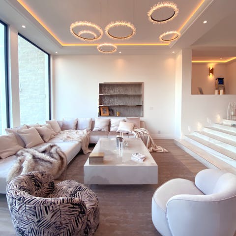 Gather in the chic living area for a family movie night