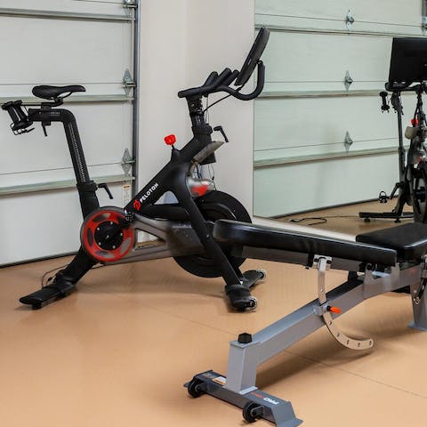 Keep up with your fitness routine at the home gym, after a day of lazying around by the pool