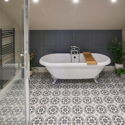 Take a long soak in the beautiful roll-top tub