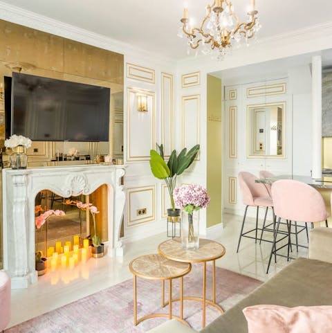 Kick back after a day of taking in the sights of Paris from the aesthetically pleasing living room
