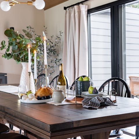 Gather around the fine wooden table for a meal together at home
