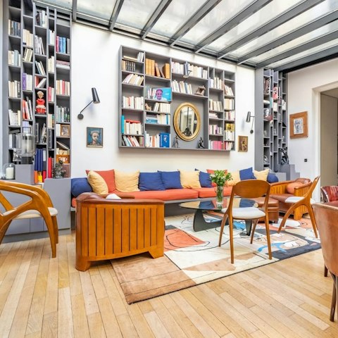 Read an art book under the natural light of the glass canopy