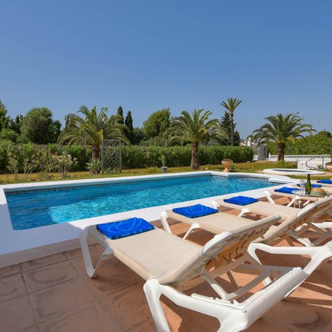 Relax on a poolside lounger with a good book, or enjoy a dip in the cool water