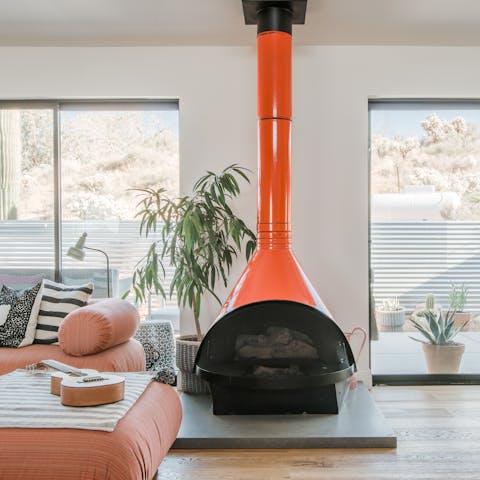 Grab a good book and cosy up by the striking fireplace