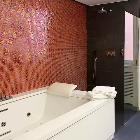 Treat yourself to a long, hot soak in the Jacuzzi bath