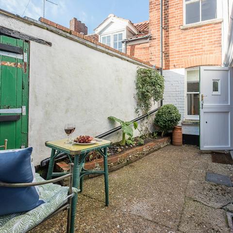 Sit outside for drinks in the little courtyard