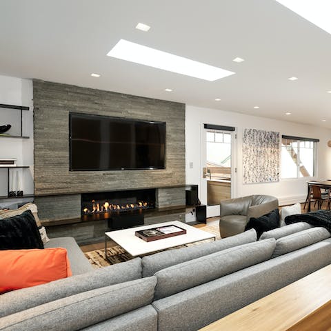Catch a movie on the 60-inch flatscreen TV