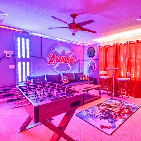Play a few rounds of foosball in the Avengers-themed games room