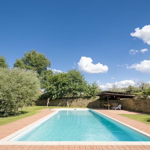 Dive into the communal swimming pool when you need cooling down