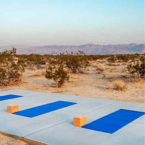Unwind with an alfresco yoga class in the middle of the desert