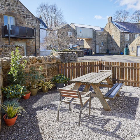 Share coffee and breakfast at the picnic table outside