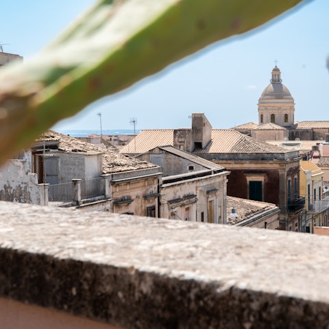 Enjoy views of Noto over a pre-dinner glass of wine