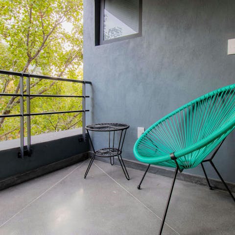 Relax with evening drinks on the little balcony
