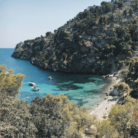 Drive ten minutes to Cala Blanca for a secluded swim
