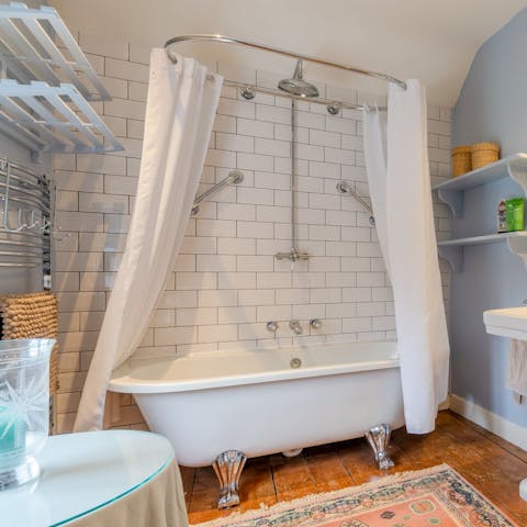 Lie back and relax in the claw-foot bath after a day out hiking