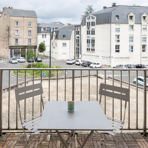 Start your day with a cup of coffee out on the balcony