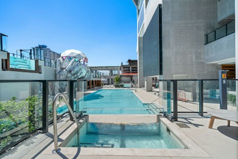 Cool off in the pool beneath open Miami skies