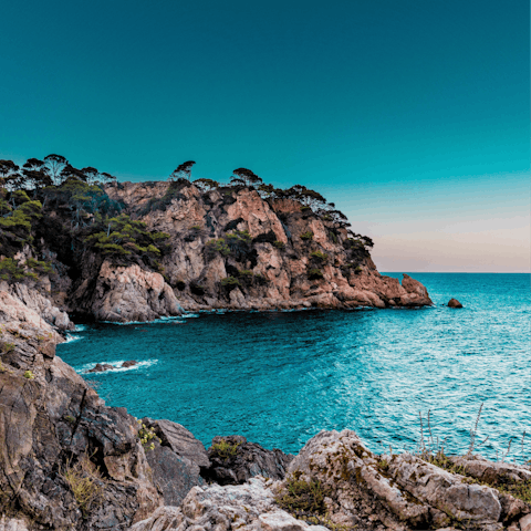 Stroll along the coastline in Marbella, a thirty minute drive away