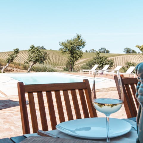 Cool off with a glass of Verdicchio by the pool
