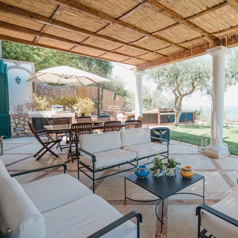 Gather for delicious evening drinks and Italian meals on the terrace