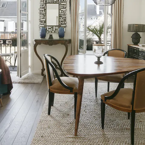 Start your day with fresh croissants and scrambled eggs at the table