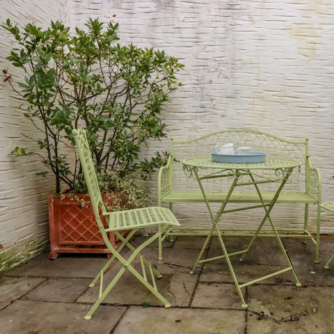 Enjoy a cup of tea in the small courtyard