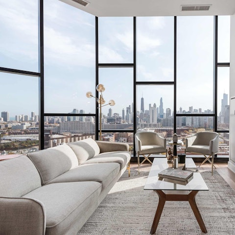 Fall in love with the skyline views from the three living areas