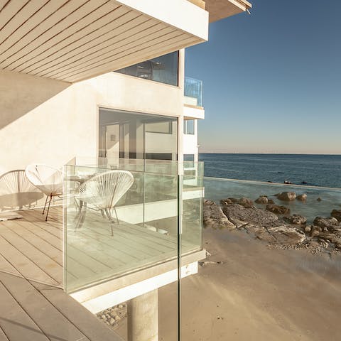 Spend the sunset hour admiring the view from one of the three balconies