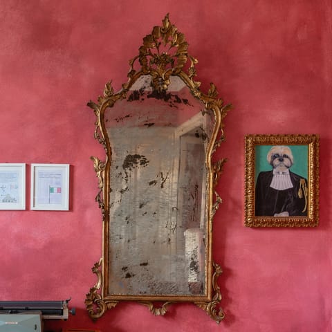 A gilt-framed mirror