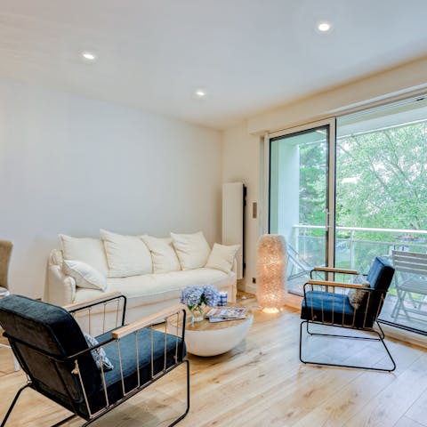 Come together in the spacious and light-filled living space