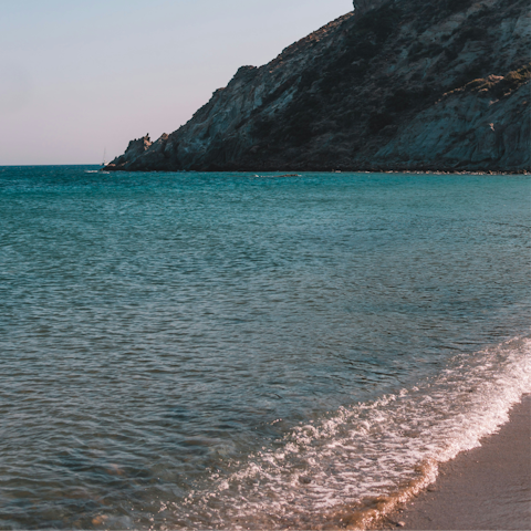 Soak up the sunshine on Glifades Beach, a short drive away