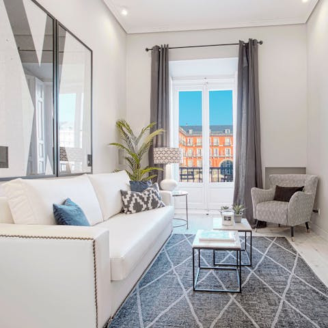 Kick back in the elegant living room after a day of touring the city on foot
