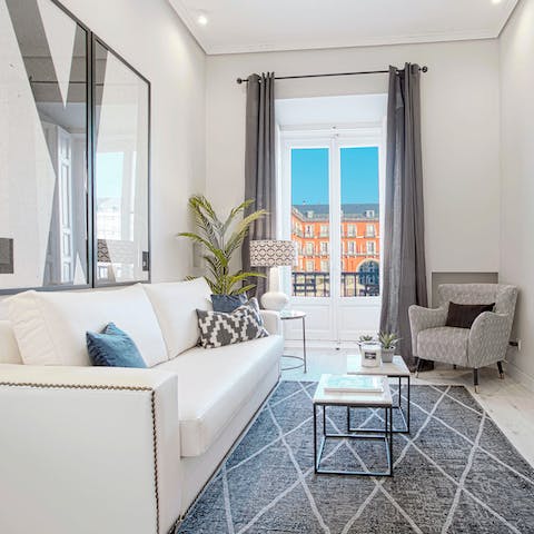 Kick back in the elegant living room after a day of touring the city on foot