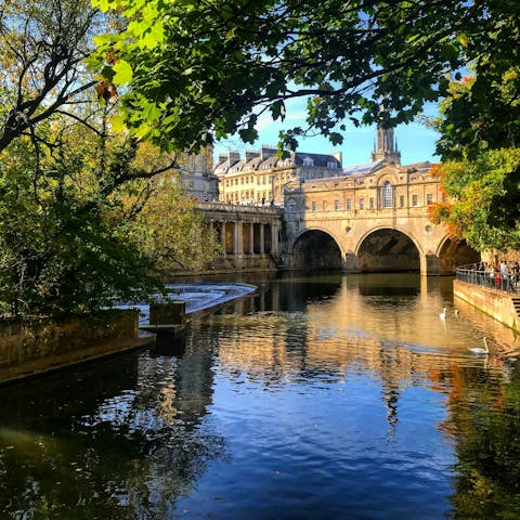 Take a riverside walk and admire Pulteney Bridge