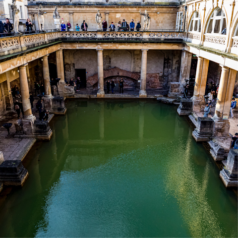 Visit the Roman Baths, just a short walk away