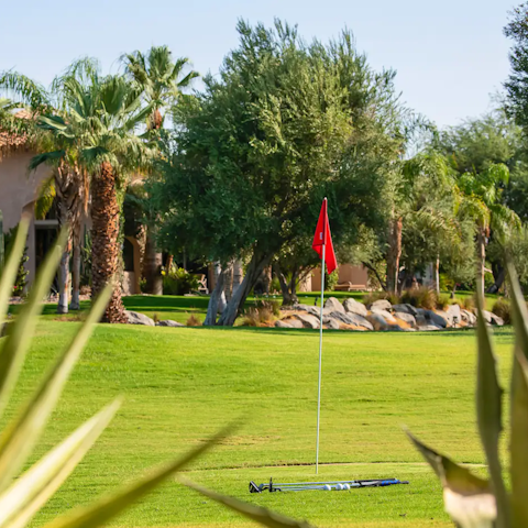 Tee off on the private five-hole golf course