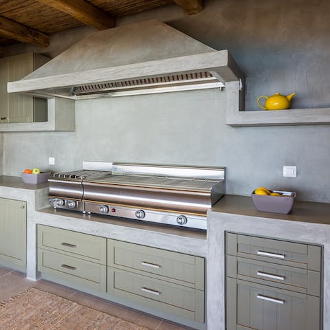 Cook dolmades and moussaka al fresco with the outdoor kitchen