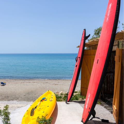 Surf the waves with canoes and standup paddleboards available for guests