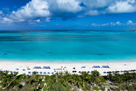Enjoy the dazzling turquoise shores of Grace Bay Beach, a short walk away