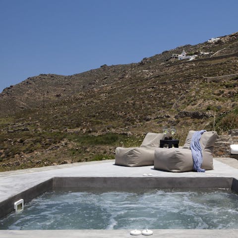 Relax in the private bubbly jacuzzi
