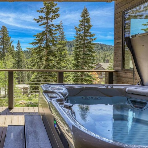 Enjoy beautiful views while soaking in the private hot tub
