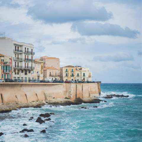 Take a forty minute drive to the coastal city of Syracuse