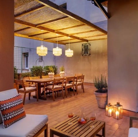 Relax on the private roof terrace with a glass of Italian wine