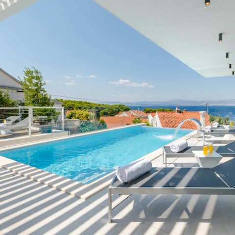 Walk to the beach or spend slow days by the pool