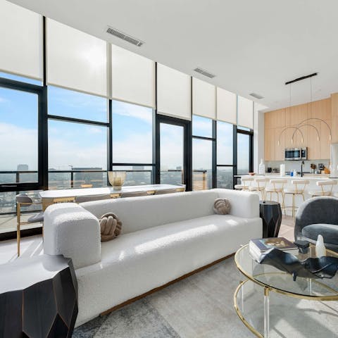 Enjoy the sweeping views, framed by floor-to-ceiling windows