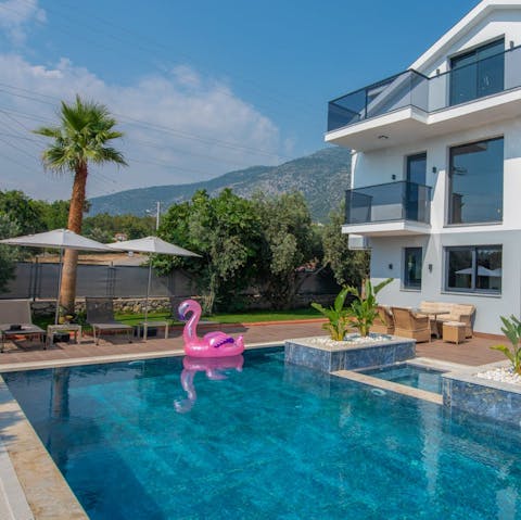 Take a dip in the pool or relax on the sun loungers