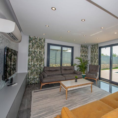 Watch your favourite flick while curled up on the cosy sofa