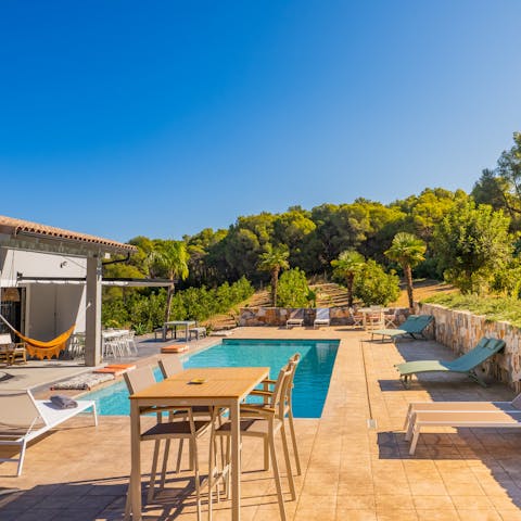 Find a wonderful sense of wellbeing whilst relaxing by the pool